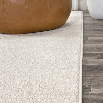 Haze Solid Low-pile Area Rug Cream